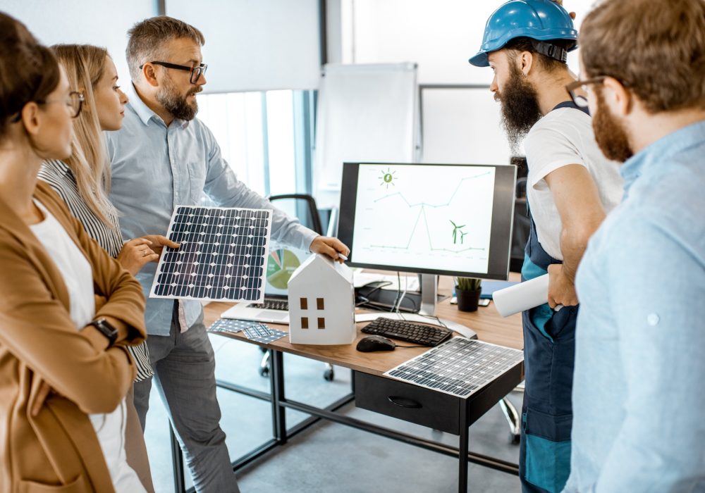 people-working-on-alternative-energy-project-in-the-office.jpg